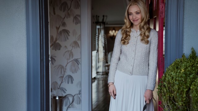 alt="The Housemaid Movie Still feauturing Amanda Seyfried smiling creepily"