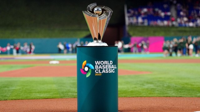 alt="Word Baseball Classic Trophy on pedestal for the 2023 WBC championship"